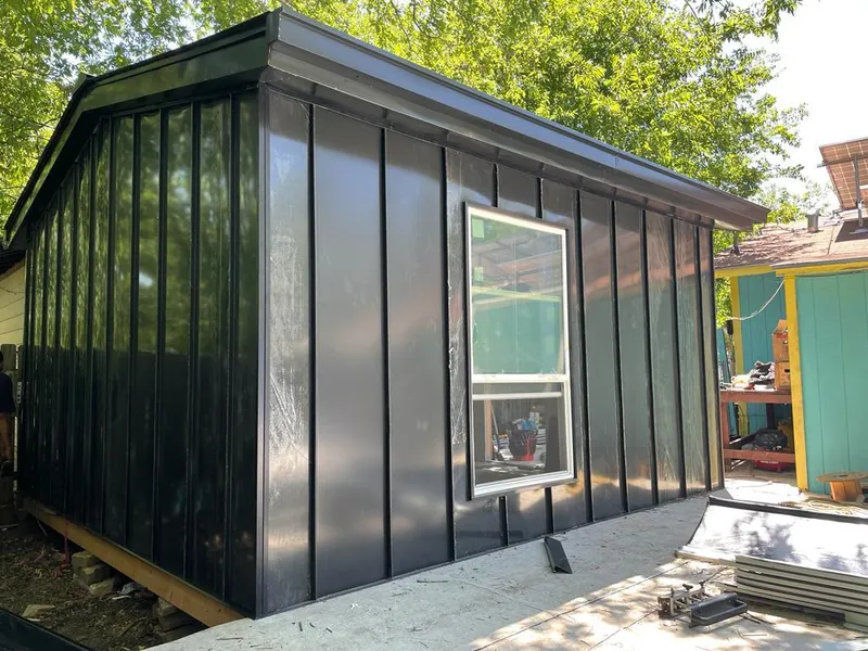 Black standing seam metal wall panels for Roof Inspection in Country Club Estates