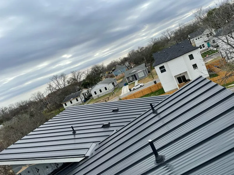 Standing seam metal roof panels with vents for Skylight Repair in Country Club Estates